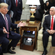 Trump shown here with sex robot vice president Mike Pence.